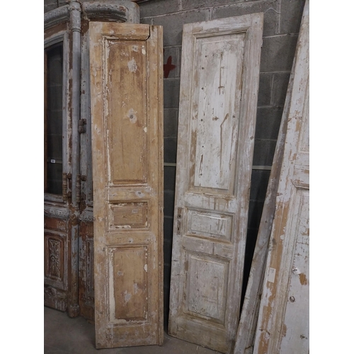 548 - Pair of 19th C. distressed pine doors {239 cm H x 55 cm W x 5 cm D}.