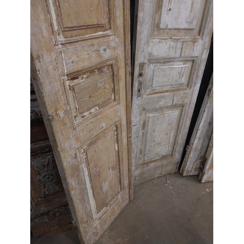 548 - Pair of 19th C. distressed pine doors {239 cm H x 55 cm W x 5 cm D}.