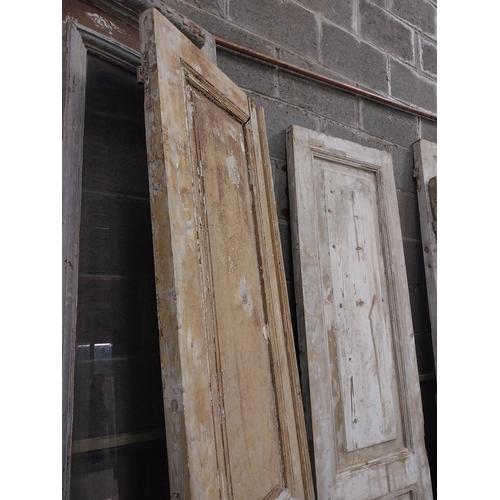 548 - Pair of 19th C. distressed pine doors {239 cm H x 55 cm W x 5 cm D}.