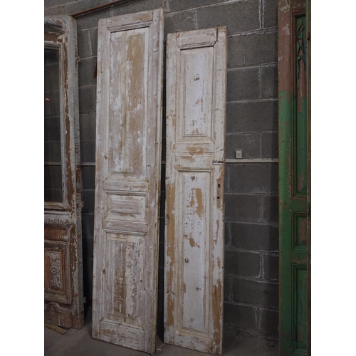 549 - Two 19th C. distressed pine doors {253, 230  cm H x 56, 44  cm W x 6, 6  cm D}.