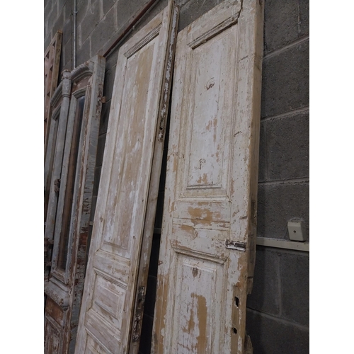 549 - Two 19th C. distressed pine doors {253, 230  cm H x 56, 44  cm W x 6, 6  cm D}.