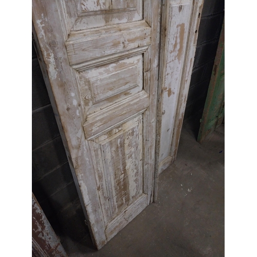 549 - Two 19th C. distressed pine doors {253, 230  cm H x 56, 44  cm W x 6, 6  cm D}.