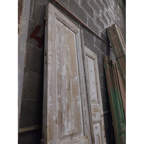 549 - Two 19th C. distressed pine doors {253, 230  cm H x 56, 44  cm W x 6, 6  cm D}.