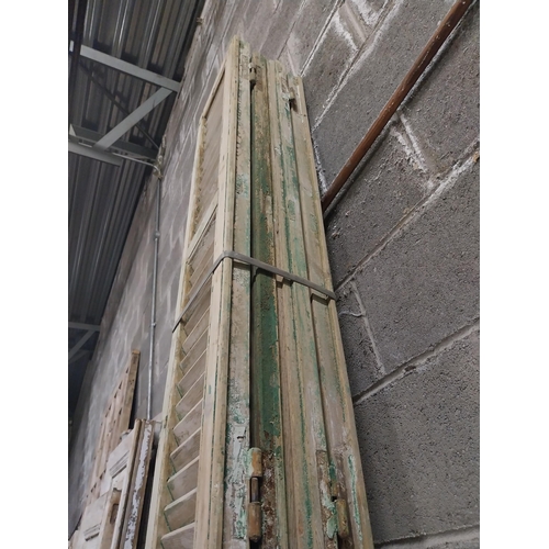 550 - Set of four 19th C. distressed pine Louvre window shutters {Approx. 325 cm H x 39 cm W x 6 cm D}.