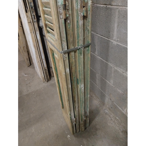 550 - Set of four 19th C. distressed pine Louvre window shutters {Approx. 325 cm H x 39 cm W x 6 cm D}.