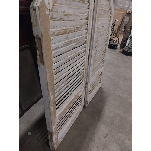 563 - Pair of 19th C. Louvre pine window shutters {140 cm H x 57 cm W x 5 cm D}.