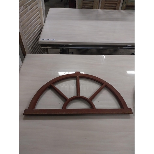 568 - Pair of good quality arched cast iron window frames {37 cm H x 67 cm W x 3 cm D}.