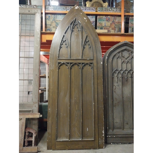 597 - Film prop timber door in the Gothic style {Approx. 330 cm H x 123 cm W x 10 cm D}.