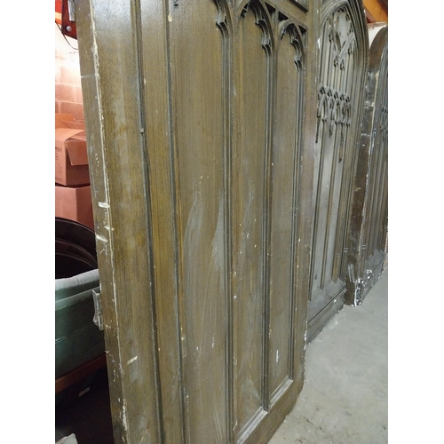 597 - Film prop timber door in the Gothic style {Approx. 330 cm H x 123 cm W x 10 cm D}.