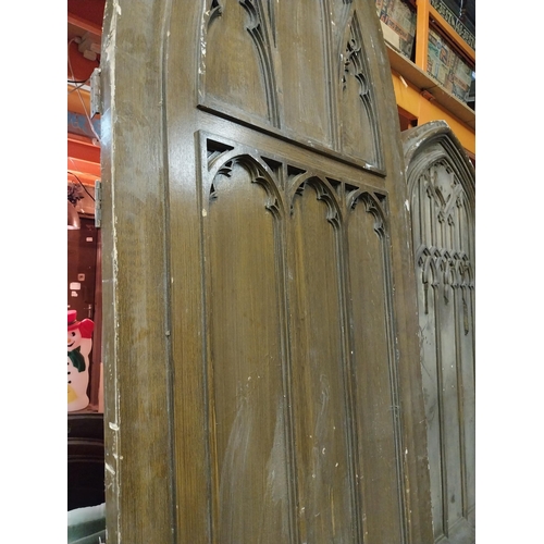 597 - Film prop timber door in the Gothic style {Approx. 330 cm H x 123 cm W x 10 cm D}.