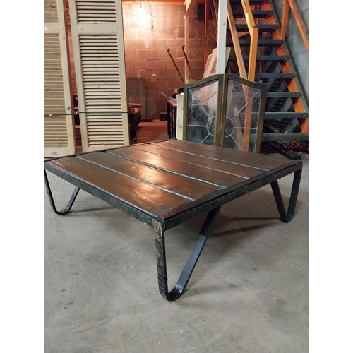 602 - Industrial metal and wooden coffee table {34 cm H x 100 cm W x 100 cm D}.