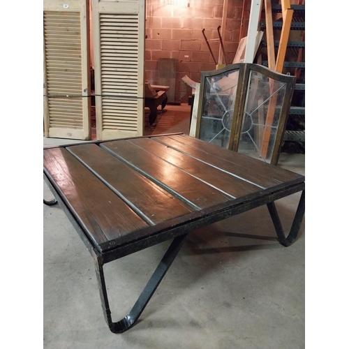 602 - Industrial metal and wooden coffee table {34 cm H x 100 cm W x 100 cm D}.