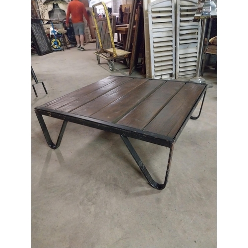 602 - Industrial metal and wooden coffee table {34 cm H x 100 cm W x 100 cm D}.