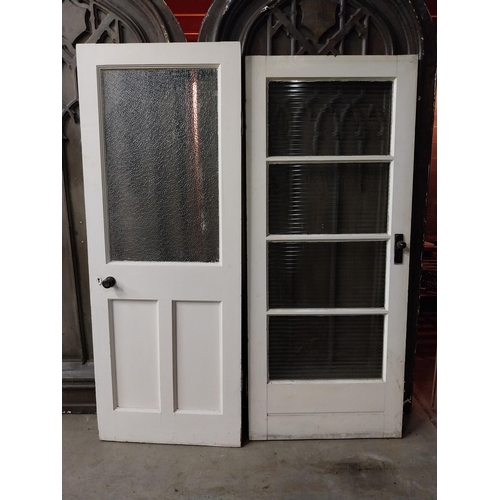 606 - Two early 20th C. painted pine doors with glass panels {198, 193  cm H x 76, 80  cm W x 5 cm D}.