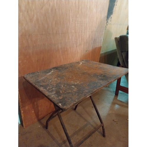 638 - Industrial metal folding table {64 cm H x 67 cm W x 68 cm D}.