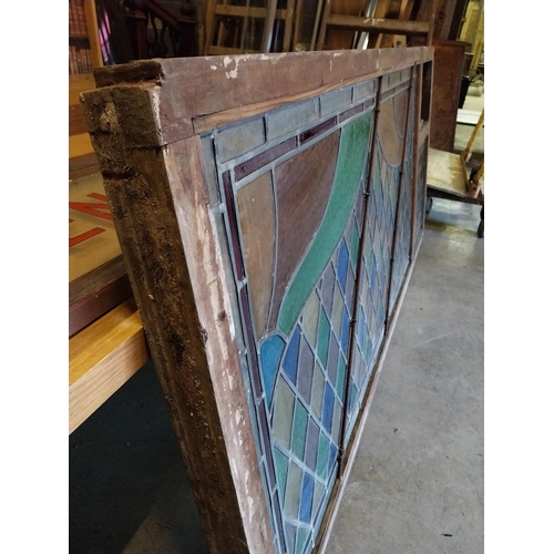 652 - 1950s leaded stain glass window mounted in mahogany frame {100 cm H x 216 cm W x 7 cm D}.