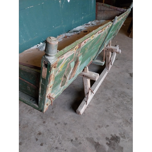 654 - 19th C. painted pine sleigh {100 cm H x 180 cm W x 101 cm D}.