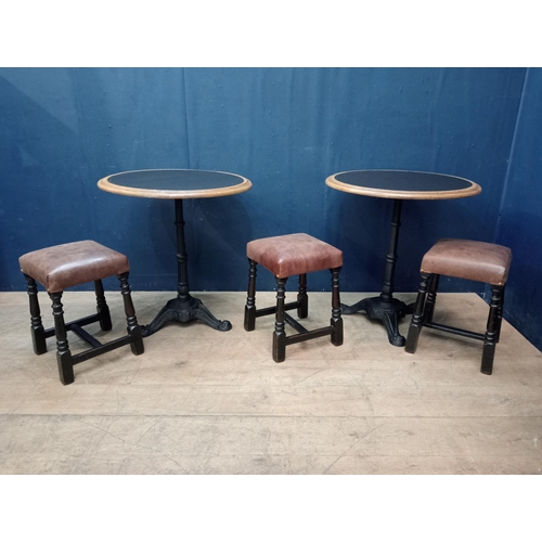 201 - Pair of cast iron pub tables  with oak and metal table tops {H 75cm x D 70cm }.