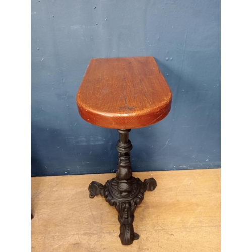 205 - Cast iron dolphin pub table with D end solid top { H 73cm x W 28cm x D 50cm}.