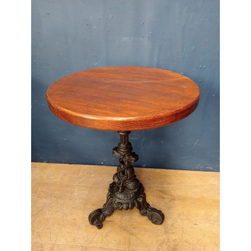 207 - Cast iron dolphin pub table with solid top {H 73cm x Dia 58cm }.