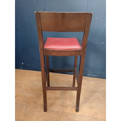 208 - Pair of high stools with red leather upholstered seats {H 100cm x W 40cm x D 40cm }.