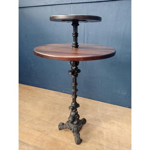 247 - Cast iron two tier drink stand table with solid tops {H 130cm x Dia 75cm x Dia 45cm }.