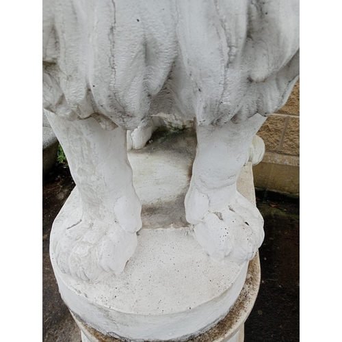 249 - Composition stone lions raised on bases {H 180cm x W 50cm x D 110cm }.