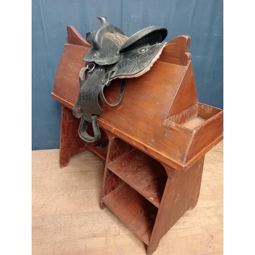 269 - Cowboys leather saddle {H 60cm x W 50cm x D 40cm }.