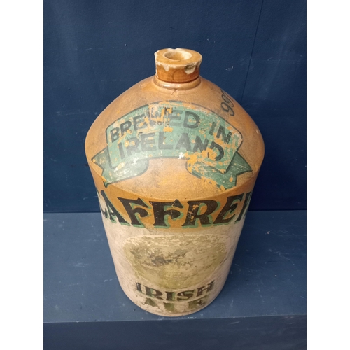 309 - Earthenware Caffreys advertising jug {H 54cm x Dia 30cm }.