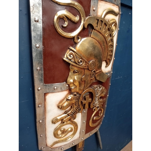 378 - Resin shield plaque with sword and spear {H 165cm x W 80cm x D 6cm }.