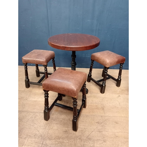 645 - Three brown leather low stools {H 47cm x W 36cm x D 36cm }.