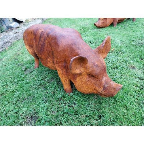 301 - Good quality large cast iron model of a pig {34cm H x 65cm W x 24cm D}