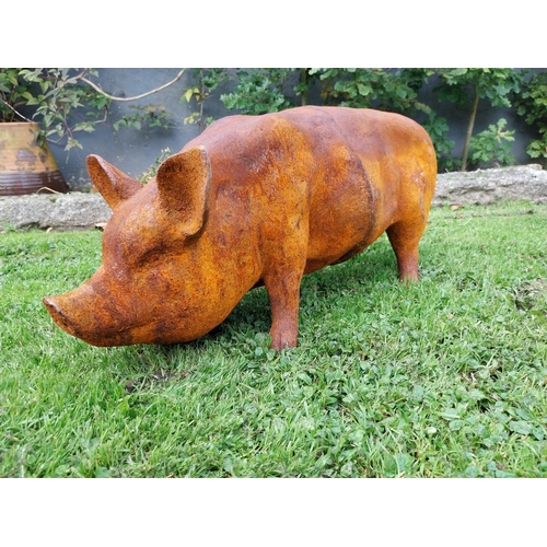 301 - Good quality large cast iron model of a pig {34cm H x 65cm W x 24cm D}