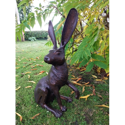 70 - Exceptional quality bronze sculpture of a hare { 61cm H x  36cm W x 19cm D}