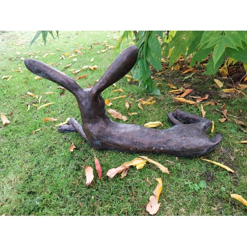 72 - Exceptional quality bronze sculpture of a hare lying down { 32cm H x  61cm W x 24cm D}