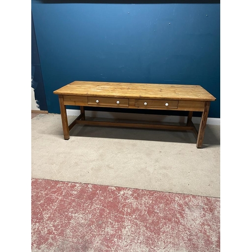 471 - 19th C. Irish pine kitchen table with two drawers in the frieze, raised on square legs and single st... 