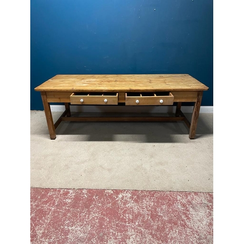 471 - 19th C. Irish pine kitchen table with two drawers in the frieze, raised on square legs and single st... 