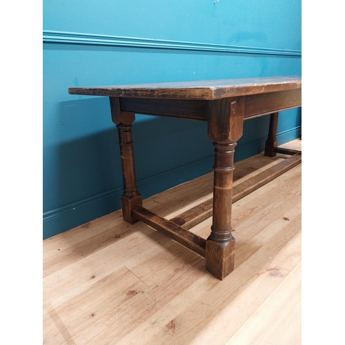 188A - Oak kitchen table raised on turned legs and single stretcher {77cm H x 218cm W x 85cm D}