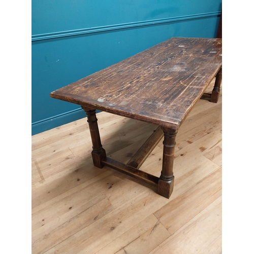 188A - Oak kitchen table raised on turned legs and single stretcher {77cm H x 218cm W x 85cm D}