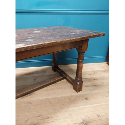 188A - Oak kitchen table raised on turned legs and single stretcher {77cm H x 218cm W x 85cm D}