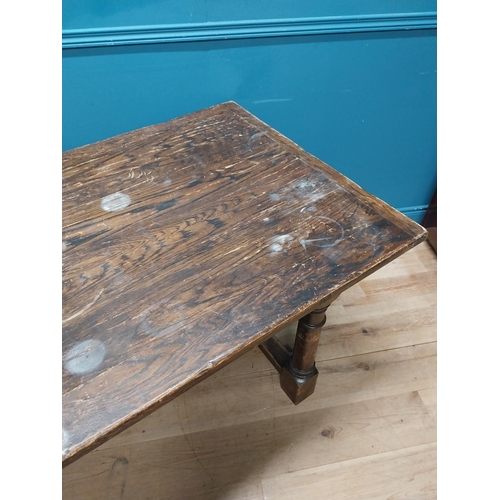 188A - Oak kitchen table raised on turned legs and single stretcher {77cm H x 218cm W x 85cm D}