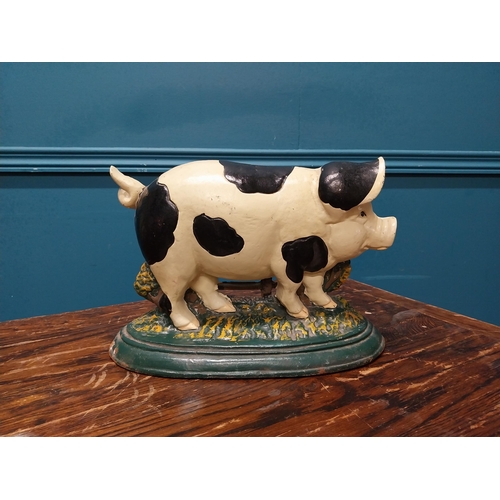 555A - Cast iron door stop in the form of a pig {22cm H x 33cm W x 10cm D}