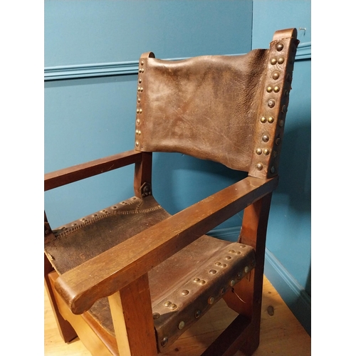 595A - Early 20th C. Oak and leather armchair {103cm H x 62cm W x 66cm D}.