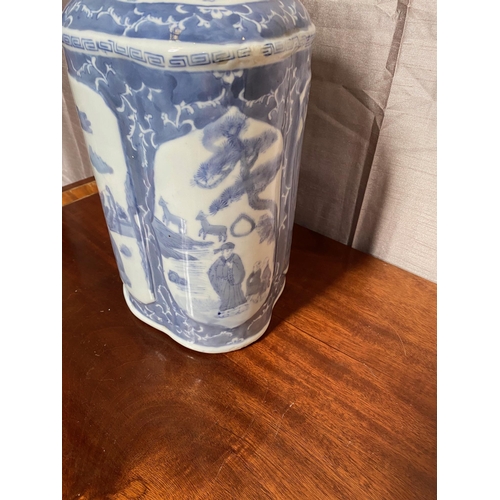 100A - Blue and white Chinese lidded jar. {37 cm H x 25 cm Dia.}. Lid has some damage.