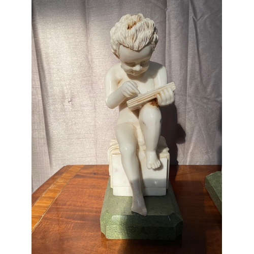 244A - Pair of marble figures of Boys reading books. {86 cm H}.