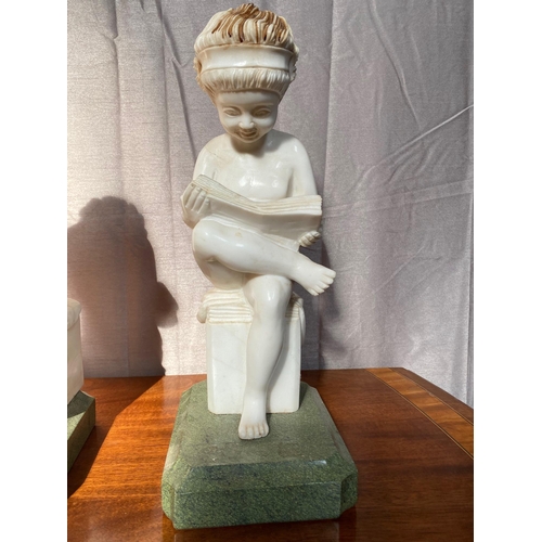 244A - Pair of marble figures of Boys reading books. {86 cm H}.