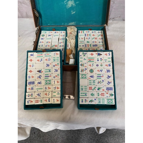 304A - Mahjong game in leather case.