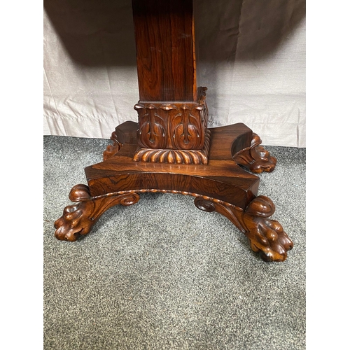 343A - Rosewood card table with square column on four carved outswept lion's paw feet. {73 cm H x 90 cm W x... 