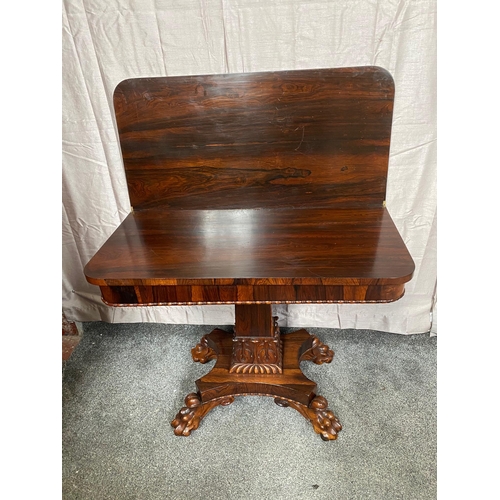 343A - Rosewood card table with square column on four carved outswept lion's paw feet. {73 cm H x 90 cm W x... 