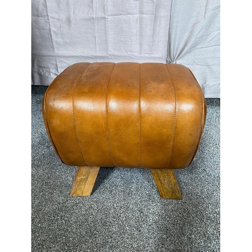 380A - Tan leather upholstered footstool. {35 cm H x 40 cm H x 29 cm D}.